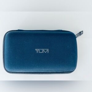 Tumi NEW Navy hard shell toiletry case.